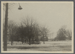 View of Whale Rib Archway. South side Amagansett Road, at junction with Egypt Lane. Little house in center, west side Egypt Lane, James G. Gay owner (1923). East Hampton, East Hampton