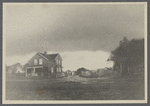 View of house and dark clouds. Looking north from Cedar Street (old North West Road). East Hampton, East Hampton