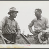 Parish F.S.A. Supervisor, Willie R. Roberts talking and discussing farm problems with his brother-in-law of Pleas W. Rodden, R. R. borrower, who had been cultivating his cotton. West Carroll Parish, La