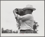 Dr. J.D. Jones examining one of farmer H.W. Jone's mules, FSA (Farm Security Administration) borrower getting benefit of veterinary cooperative in West Carroll Parish, Louisiana