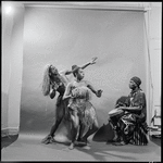 Curtiss James with unidentified dancer and drummer