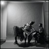 Curtiss James with unidentified dancer and drummer