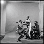 Curtiss James with unidentified dancer and drummer
