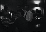 Unidentified people at a dinner table