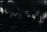 Unidentified people in a living room