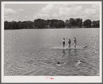 On Saturday afternoons and Sundays boys and children from nearby farms and neighborhoods go swimming in Lake Providence, Louisiana