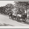 Returning home with wagons loaded with entire family and supplies on Saturday evening. Lake Providence, Louisiana
