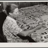 Mrs. Clarence N. Pace's mother-in-law quilting in their home. Transylvania Project, Louisiana