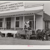 One of project families loading up their wagon with supplies at the cooperative store. Transylvania Project, Louisiana