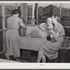 Showers for both babies and older children and for parents and complete laundry facilities are provided in the utility building for members of the Osceola migratory labor camp. Belle Glade, Florida