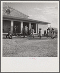 The assembly building is always open for meetings, games, reading, and recreational activities at Okeechobee migratory labor camp. Belle Glade, Florida