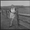 Unidentified woman and fence