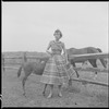Unidentified woman with colt