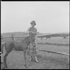 Unidentified woman with colt