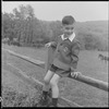 Child on fence