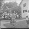 Unidentified women outdoors
