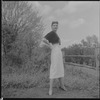 Unidentified woman outdoors