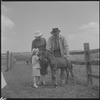 Unidentified people with a colt