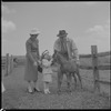 Unidentified people with a colt