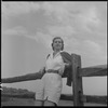 Unidentified woman and fence