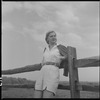 Unidentified woman and fence