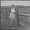 Unidentified woman and fence