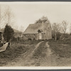 House behind Ed. Baker house. Former sheep stable altered into a dwelling. Now occupied by a son of John M. Brown. East Hampton, East Hampton