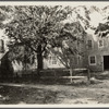 Old Dominy House. West side North Main Street (road to Three Mile Harbor), about a block north of railroad viaduct. 2 millstones used for doorsteps.  East Hampton, East Hampton