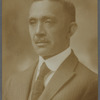 Studio portrait of Paul D. Blackwell in pinstriped suit