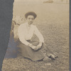 Woman sitting on lawn