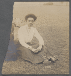 Woman sitting on lawn