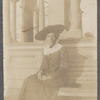 Woman in wide hat and lace collar