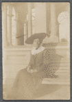 Woman in wide hat and lace collar