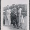 Jean and John Hutson standing with woman