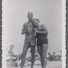 Man and woman standing on beach