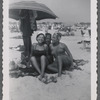 Jean Hutson and others on beach blanket