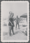 Jean Hutson standing with others at beach