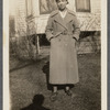 Woman in beret and long coat