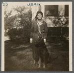 Seventeen-year-old Jean Blackwell Hutson on lawn in hat and scarf