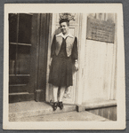 Jean Blackwell Hutson standing next to plaque