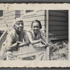 Jean Blackwell Hutson and older woman leaning on gate