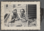 Jean Blackwell Hutson and older woman leaning on gate