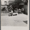 Jean Blackwell Hutson on bench reading