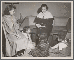 Jean Blackwell Hutson reading to children