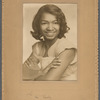 Joan sitting for studio portrait