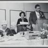 Jean Blackwell Hutson behind Frederick O'Neal at podium