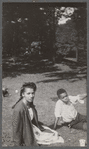 Woman and boy on lawn