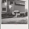 Camp members moving into shelter at Okeechobee migratory labor camp. Belle Glade, Florida