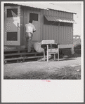 Camp members moving into shelter at Okeechobee migratory labor camp. Belle Glade, Florida