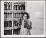 The canned goods closet, and chart (on door) of one of the project families. Terrebonne Project, Schriever, Louisiana